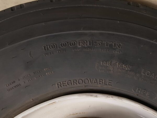 10.00 R15 TR Goodyear G114 Unisteel Tire w/ 100% Tread on Steel Budd Wheel-18