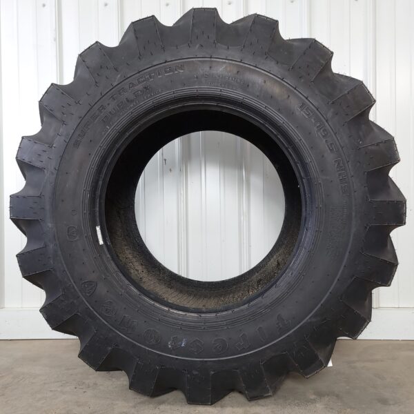 New Old Stock 15-19.5 NHS Firestone Super Traction Loader Tires in 12-Ply Rating
